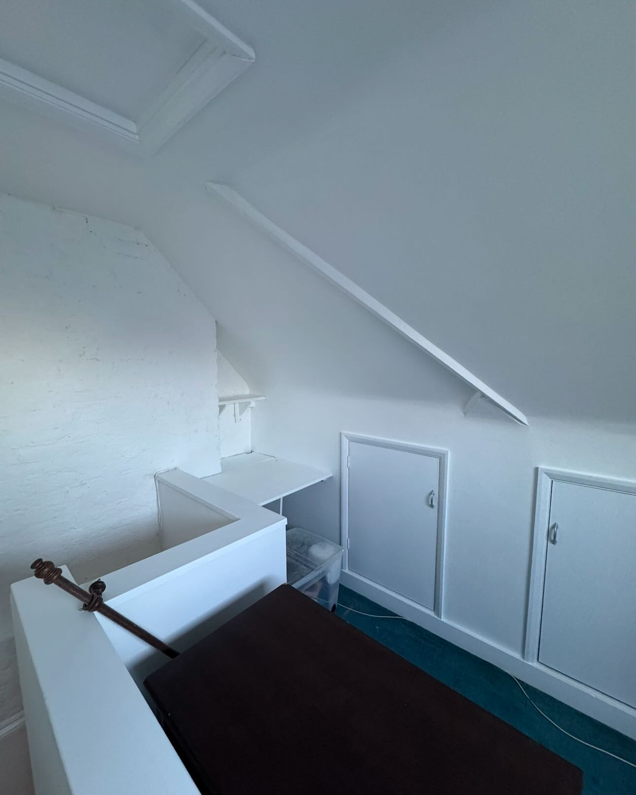 Repaired and freshly decorated white stairwell